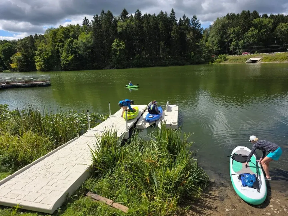 Mogadore Reservoir kayak access Kayak launch and floating dock at Mogadore Reservoir with paddlers at the water